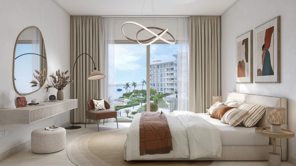 Spacious master bedroom with neutral décor and large windows